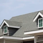 Clean asphalt shingle roof on a home after professional soft wash roof cleaning.